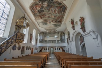 Interior of the Roman Catholic parish church of the Assumption of the Virgin Mary with organ loft