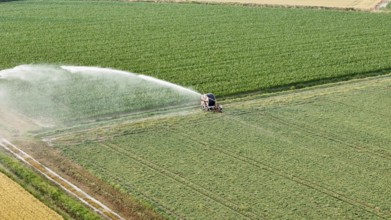 Modern agricultural technology ensures essential water supply for soybean crops during springtime