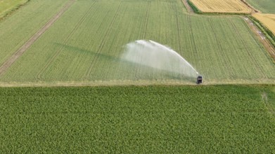 Irrigation system watering soybeans during springtime in the fertile Po Valley region of Northern