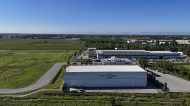 Cremona, Italy - August 22nd 2025 Aerial View of a Modern Data Center Facility with Cooling Towers