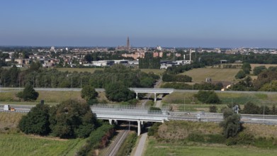 Panoramic view of Cremona skyline and agricultural landscape near a Northern Italian city under a