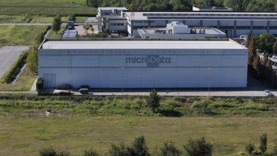 Cremona, Italy August 22nd 2025 Aerial view revealing MicroData Group headquarters, massive data
