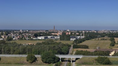 Panoramic view of Cremona skyline and agricultural landscape near a Northern Italian city under a
