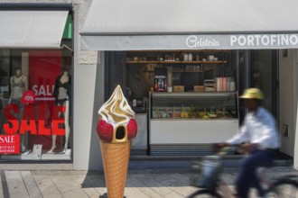 Shop window with swimwear 70% SALE, and gelateria, Dornbirn, Vorarlberg, Austria