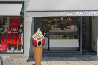 Shop window with swimwear 70% SALE, and gelateria, Dornbirn, Vorarlberg, Austria