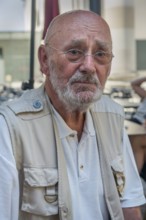 Elderly gentleman with beard, glasses and a somewhat sad look, Dornbirn, Vorarlberg, Austria