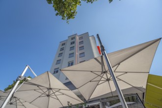 Light grey sunshades in front of a high-rise building, Dornbirn, Vorarlberg, Austria