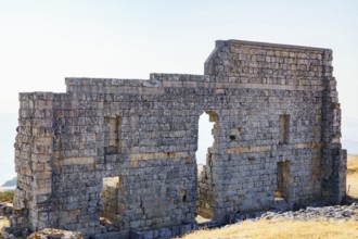 08/21/2025 Ronda, Malaga, Spain Main facade of the ruins of the Roman amphitheater of Acinipo with
