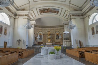 The Roman Catholic parish church of St Martin, altar with floral decorations, interior, Dornbirn,