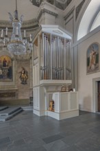The Roman Catholic parish church of St Martin, interior with side organ, wall frescoes and crystal