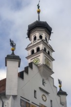 Town hall tower with clocks, metal eagles, Justitia and bronze trombone blower, Kempten, Allgäu,