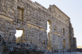 08/21/2025 Ronda, Malaga, Spain Main facade of the ruins of the Roman amphitheater of Acinipo with