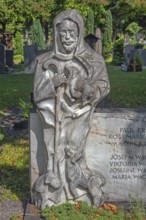 Gravesite with stone figure, the good shepherd with lambs, catholic cemetery, Kempten, Allgäu,