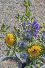 Gravesite with floral decoration, catholic cemetery, Kempten, Allgäu, Bavaria, Germany