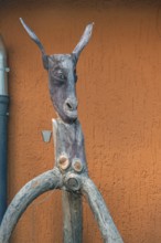 Whimsical tree sculpture, donkey's head with long ears at the Kultur-Wirtschaft in the Allgäuhalle,