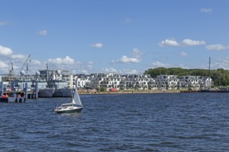 Boats of the German Navy, residential area on the eastern bank of the Unterwarnow, sailing boat,