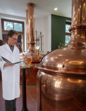 Brewery inspector with beer glass