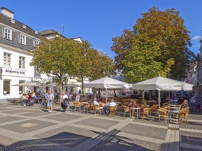Pedestrian zone, traffic-calmed, café, trees, pavement, old town, architecture, shops, people, blue