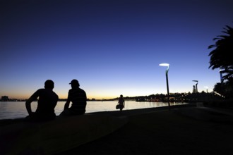 People at the riverside, evening mood at the Swan River, Central City Area, Perth, Western