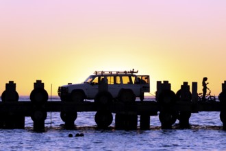 Sunset on the beach, car on a jetty near Lancelin, Perth, Western Australia, WA, Indian Ocean,