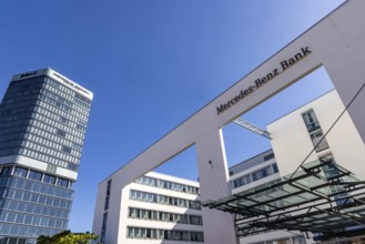 Mercedes Benz Bank Stuttgart. Exterior view with logo. On the left the Porsche Design Tower.