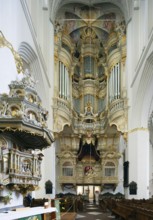 Left Renaissance pulpit from 1574 with baroque pulpit cover from 1723, Marienkirche,