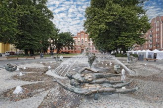 Fountain of joie de vivre, behind it university, university square, harbour city, Hanseatic city,