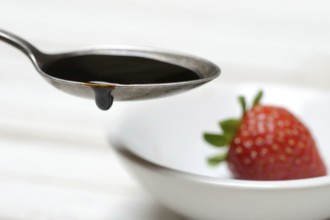 Spoon with Crema di Balsamico, balsamic vinegar