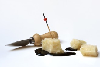 Parmesan cheese, pieces of cheese and crema di balsamico
