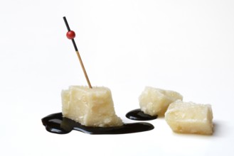 Parmesan cheese, pieces of cheese and crema di balsamico