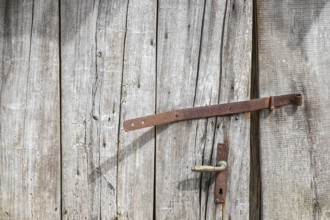 Old wooden door with iron fittings, North Rhine-Westphalia, Germany