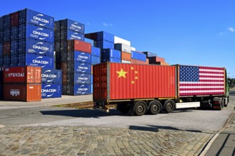 Container with USA and China flag on a lorry, stacked containers in the background, customs dispute
