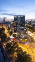 Aerial view of Hamburg's warehouse district during the blue hour with a view of the Zollkanal,