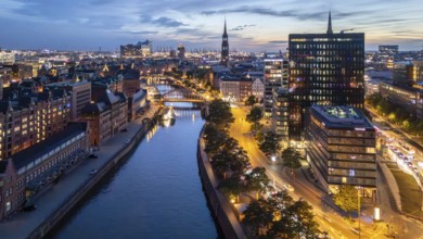 Aerial view of Hamburg's Speicherstadt warehouse district at blue hour with a view of the Zollkanal