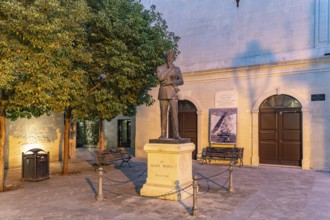 Monument to the politician Aldo Moro at dusk, Maglie, Apulia, Italy