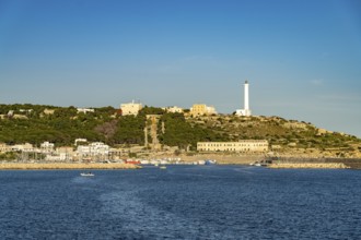 Town view with harbour and lighthouse in Santa Maria di Leuca, Apulia, Italy