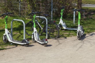 E-scooters parked at a bicycle stand, Germany