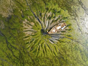 Top Down over boat and mud from drone, Paulsgrove Lake, Portchester Castle, Portchester, Fareham,