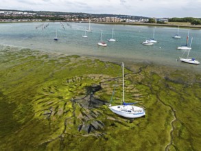 Boats and mud from drone, Paulsgrove Lake, Portchester Castle, Portchester, Fareham, Hampshire,