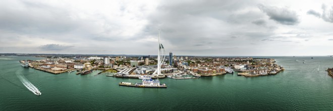 Panorama of Portsmouth Harbour over Spinnaker Tower from a drone, Portsmouth, Gosport, England,