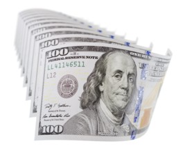 Abstract set of U.S. 100 dollar bills isolated on a white background