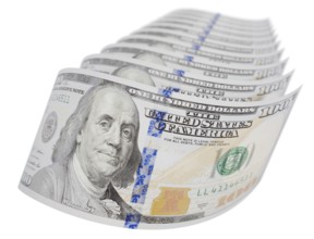 Abstract set of U.S. 100 dollar bills isolated on a white background