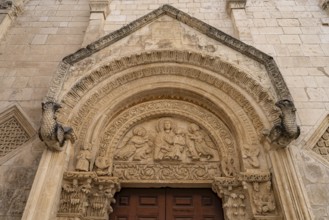 Relief above the portal of the church of Santa Maria Maggiore in Monte Sant'Angelo, Gargano,