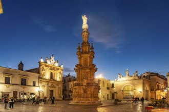 The Piazza Salandra square with the Guglia dell'Immacolata column and the Chiesa di San Trifone