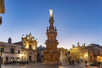 The Piazza Salandra square with the Guglia dell'Immacolata column and the Chiesa di San Trifone