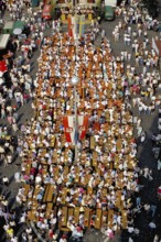 View from the tower of St John's Church of the annual well-attended town festival, crowded visitors