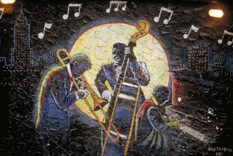 Painting of a music group at the Berlin Wall, 1991, Berlin, Germany