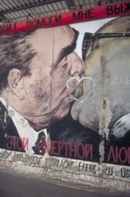 Artwork shows Leonid Brezhnev and Erich Honecker kissing, painting was created in 1990 at the
