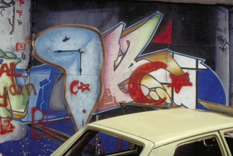 Painting at the Berlin Wall, created in the 1990s, Berlin, Germany