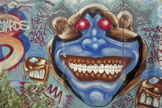 Painting at the Berlin Wall, created in the 1990s, Berlin, Germany